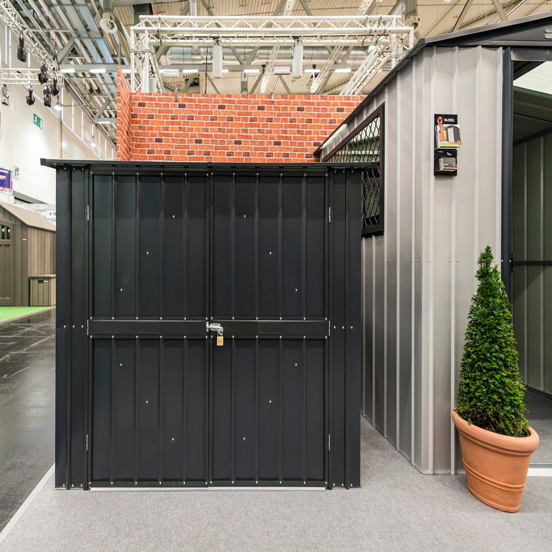 Globel bicycle store front image with doors shut, in situ to see scale